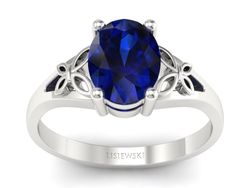 Złoty pierścionek z szafirem białe złoto - jg347bsz