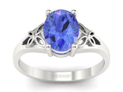 Złoty pierścionek z tanzanitem białe złoto - jg347bt