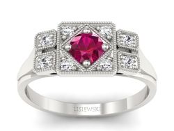 Pierścionek z rubinem i brylantami białe złoto - p15021br