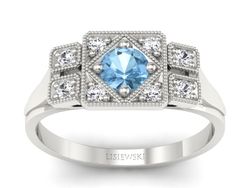 Pierścionek z topazem i brylantami białe złoto - p15021btp