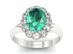 Złoty pierścionek ze szmaragdem i brylantami - p15037bsm