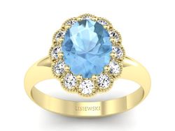 Złoty pierścionek z topazem i brylantami - p15037za