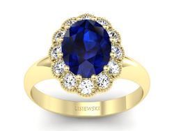 Złoty pierścionek z szafirem i brylantami złoty - p15037zsz