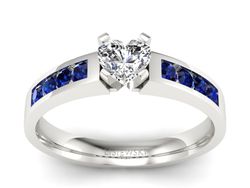 Złoty pierścionek z diamentem i szafirami - P15042bszaf