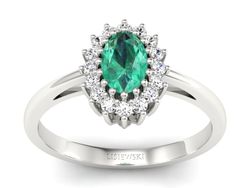 Złoty pierścionek ze szmaragdem z brylantami - P15088BSM