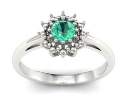 Złoty pierścionek białe złoto ze szmaragdem - P15097Bsm