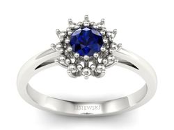 Złoty pierścionek z szafirem białe złoto - P15097Bsz