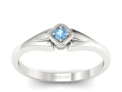 Złoty pierścionek z topazem białe złoto - P15207ba