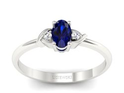 Pierścionek z szafirem i brylantami białe złoto - P15270bsz
