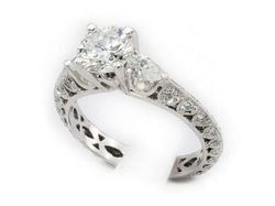 Pierścionek z brylantem i diamentami złoto 750 - P15279b_750