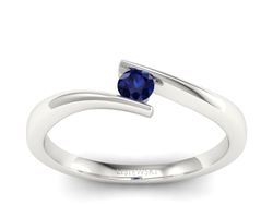 Złoty pierścionek z szafirem białe złoto - P15302bsz