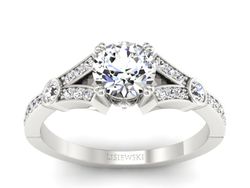 Złoty pierścionek z brylantami białe złoto - P15304b