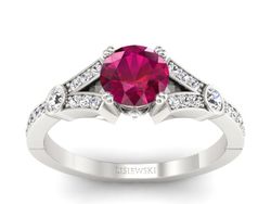 Pierścionek z rubinem i brylantami białe złoto - P15304br