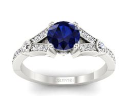 Pierścionek z szafirem i brylantami białe złoto - P15304bsz