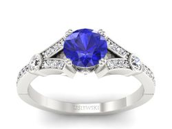 Pierścionek z szafirem i brylantami białe złoto - P15304bszc