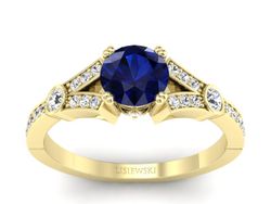 Złoty pierścionek z szafirem i brylantami - P15304zsz