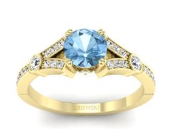 Pierścionek z topazem i brylantami żółte złoto - P15304ztp