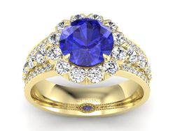 Złoty pierścionek z szafirem i diamentami - P15325zszc