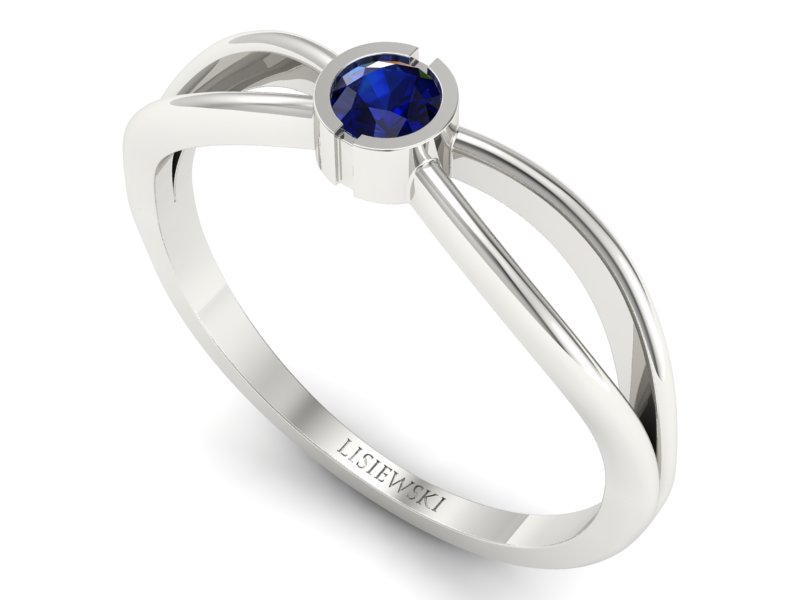 Złoty pierścionek z szafirem w białym złocie olśniewa - p16016bsz