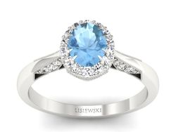 Pierścionek z topazem z brylantami złoto 585 - p16023btop