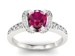 Pierścionek z rubinem i brylantami białe złoto - p16034br