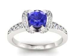 Pierścionek z szafirem i brylantami białe złoto - p16034bszc