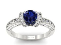 Pierścionek z szafirem i brylantami białe złoto - p16061bsz