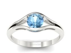Złoty pierścionek z topazem białe złoto - p16101ba