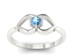 Złoty pierścionek z topazem białe złoto - p16142ba