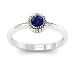 Złoty pierścionek z szafirem białe złoto - p16166bsz