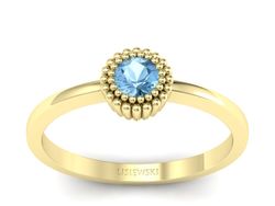 Złoty pierścionek z topazem żółte złoto - p16166ztp