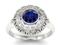 Pierścionek z szafirem i brylantami białe złoto - p16189bsz