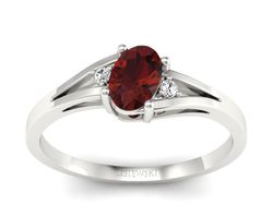 Pierścionek z granatem i brylantami białe złoto - p16192bgr