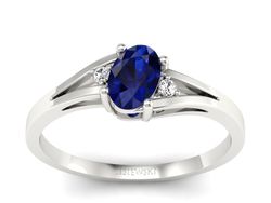 Pierścionek z szafirem i brylantami białe złoto - p16192bsz
