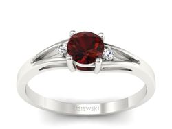 Pierścionek z granatem i brylantami białe złoto - p16193bgr