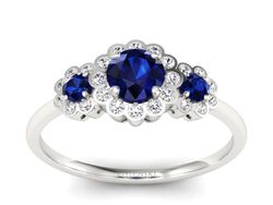 Złoty pierścionek z szafirami i brylantami - p16196bsz