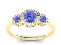 Złoty pierścionek z tanzanitami i brylantami - p16196zt