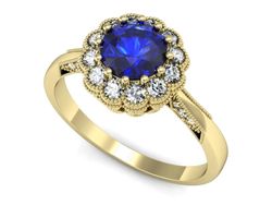 Pierścionek z szafirem i diamentami żółte złoto - p16203zszc