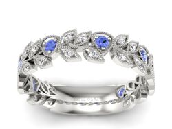 Obrączka białe złoto z tanzanitami i brylantami - p16231bt