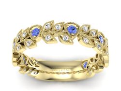 Obrączka żółte złoto z tanzanitami i brylantami - p16231zt