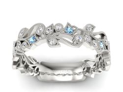 Obrączka białe złoto z topazami i brylantami - p16232btp