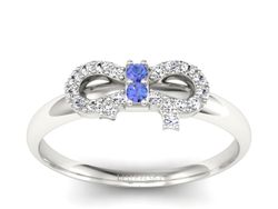 Złoty pierścionek z tanzanitami i brylantami - p16241bt