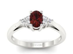 Pierścionek z granatem i brylantami białe złoto - p16248bgr