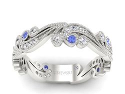 Obrączka z tanzanitami i brylantami białe złoto - p16271bt