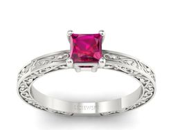 Bajeczny pierścionek z białego złota z rubinem - p16276br