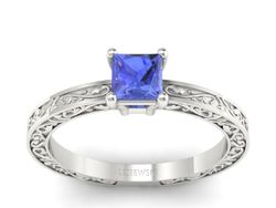 Złoty pierścionek z tanzanitem w białym złocie 585 - p16276bt