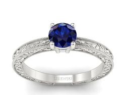 Pierścionek z szafirem w białym złocie pełen blasku - p16277bsz