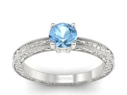 Pierścionek z topazem w białym złocie delikatny luksus - p16277btp