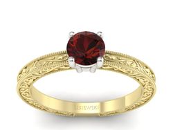 Pierścionek z granatem żółte białe złoto - p16277zbgr