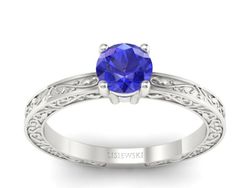 Złoty pierścionek z szafirem w białym złocie próby 585 - p16278bszc